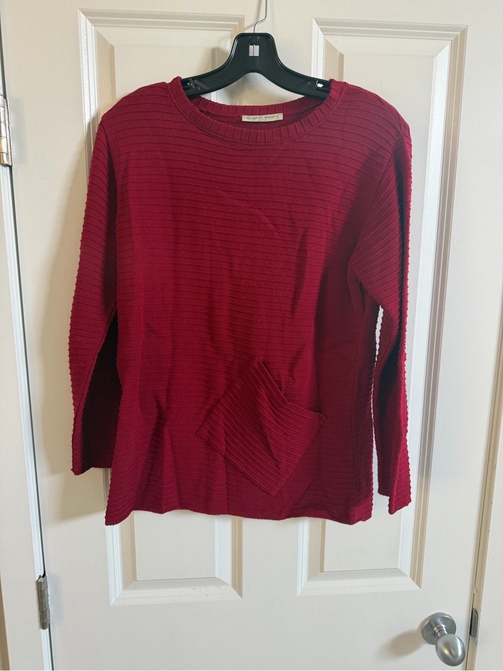 Margaret Winters red sweater